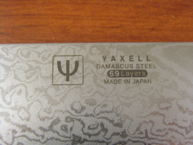 Нож поварской Yaxell Ran 36000 20 см